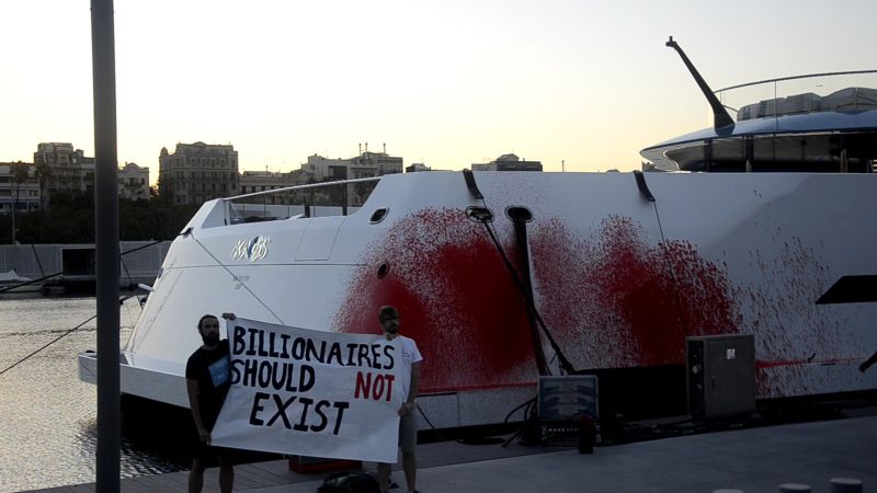 "Billionaire Walmart Heiress's Superyacht Targeted Again: Activists Strike with Red Paint"