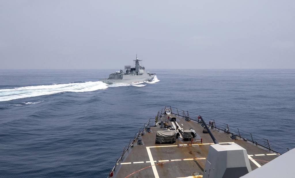 Tensions rise as US releases video of close encounter with Chinese warship.