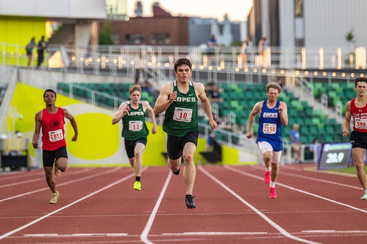 State track athletes break records and dazzle in competitive races.