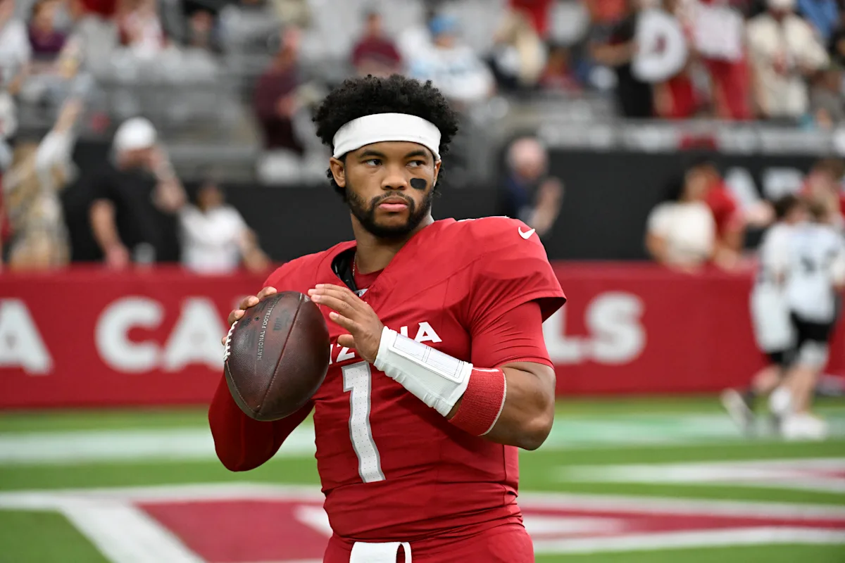 Featured image for Kyler Murray Apologizes for Posting Photo with Pit Bull in Vick Jersey