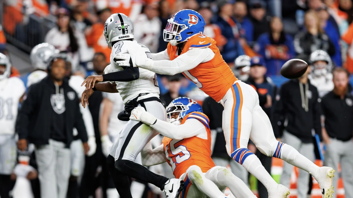 Raiders QB Geno Smith and Guard Powers-Johnson Suffer Injuries in Loss to Broncos