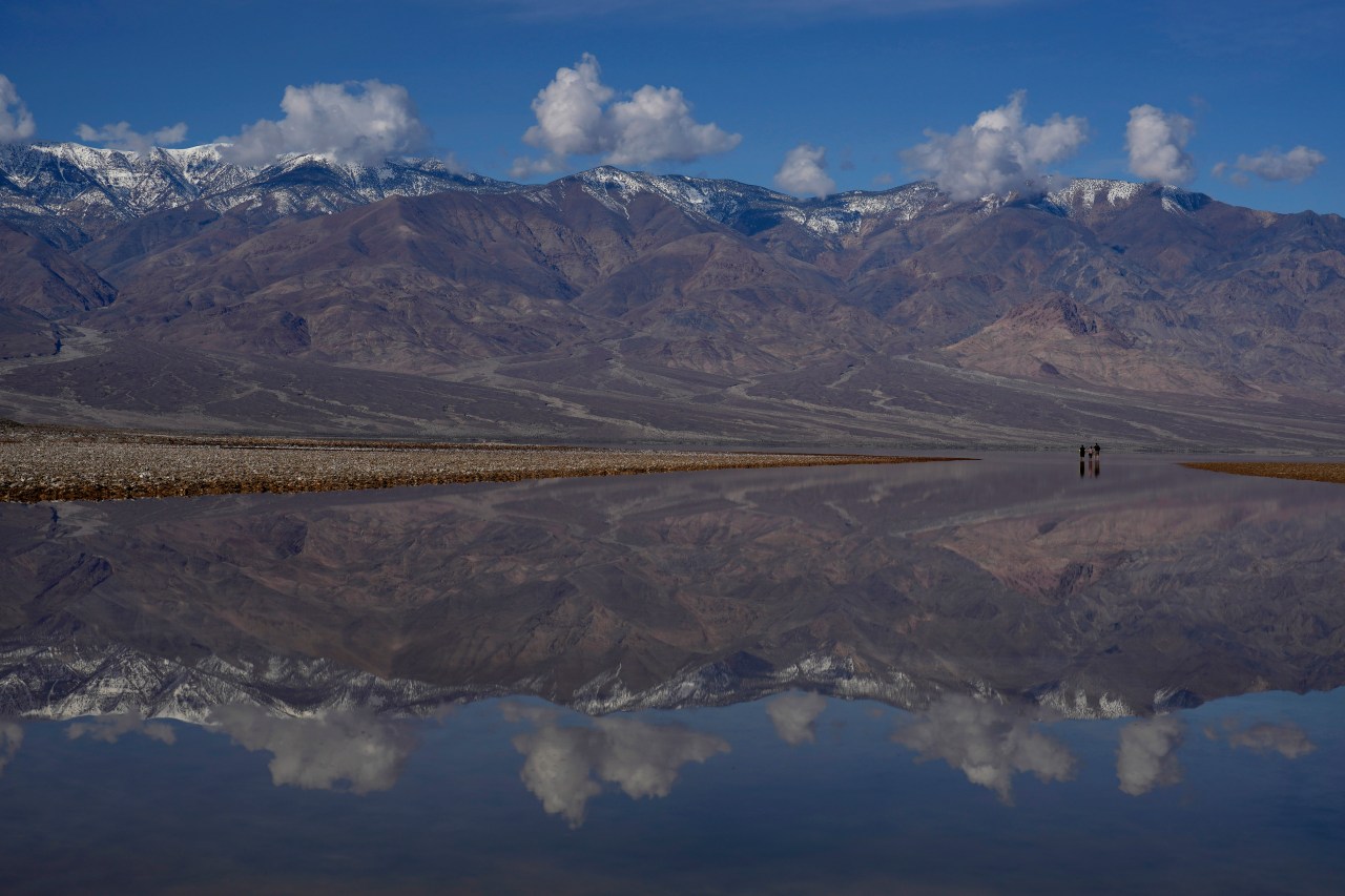 Featured image for "Death Valley's Rare Temporary Lake Reappears Amid Torrential Rains"