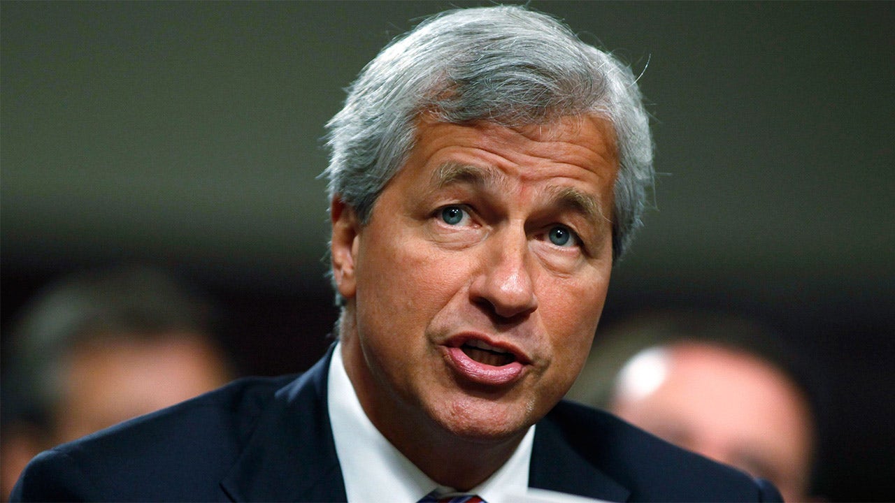 Featured image for Jamie Dimon warns of economic risks and cautions against using certain terms.