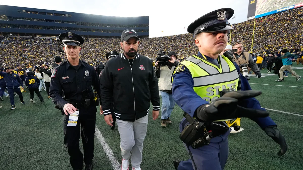 "Ohio State Fans Celebrate Victory over Michigan in 2023 Rivalry Game"