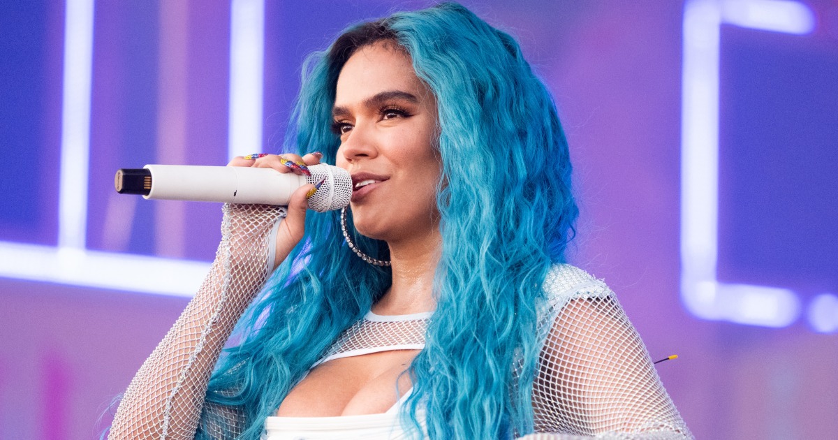 Featured image for Karol G slams magazine for disrespectful photoshopping of her cover.