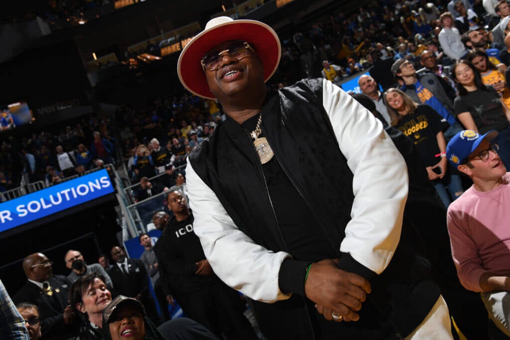 Rapper E-40 alleges racial bias in ejection from Warriors-Kings game.