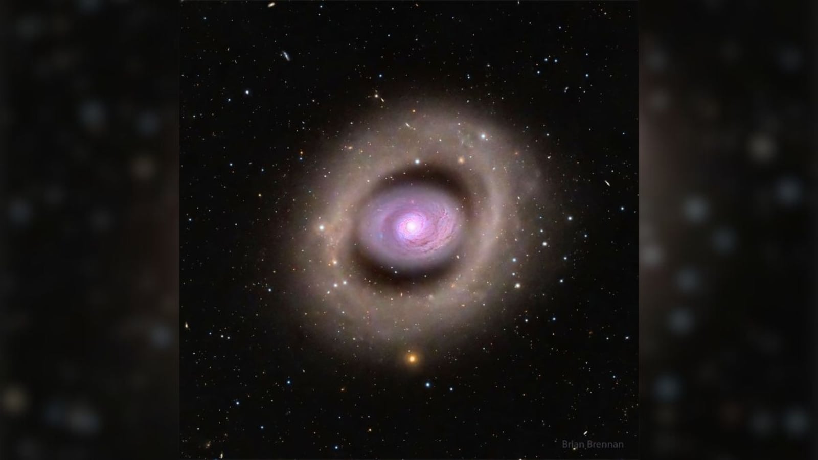 "Stunning Double Ring Galaxy and Planet's Demise Captured by NASA"