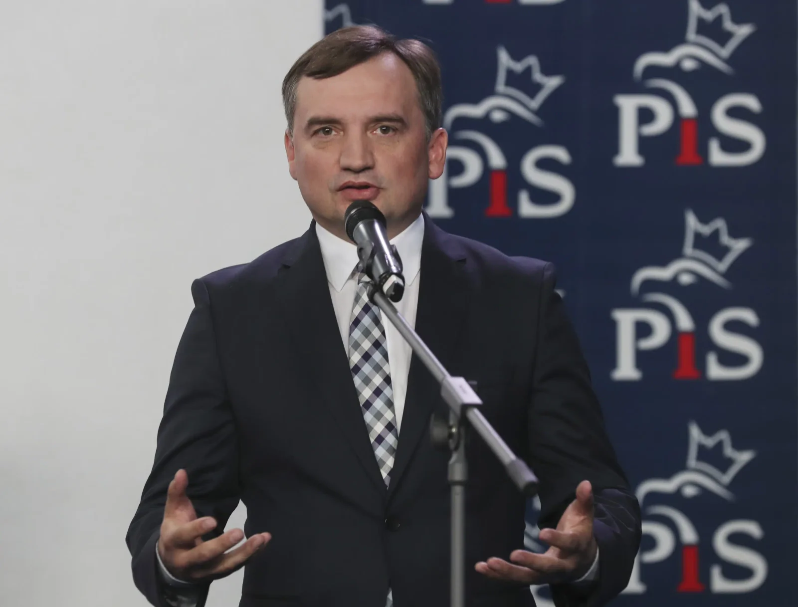 Controversy Surrounds Poland's Justice Minister Carrying a Pistol During Official Duties