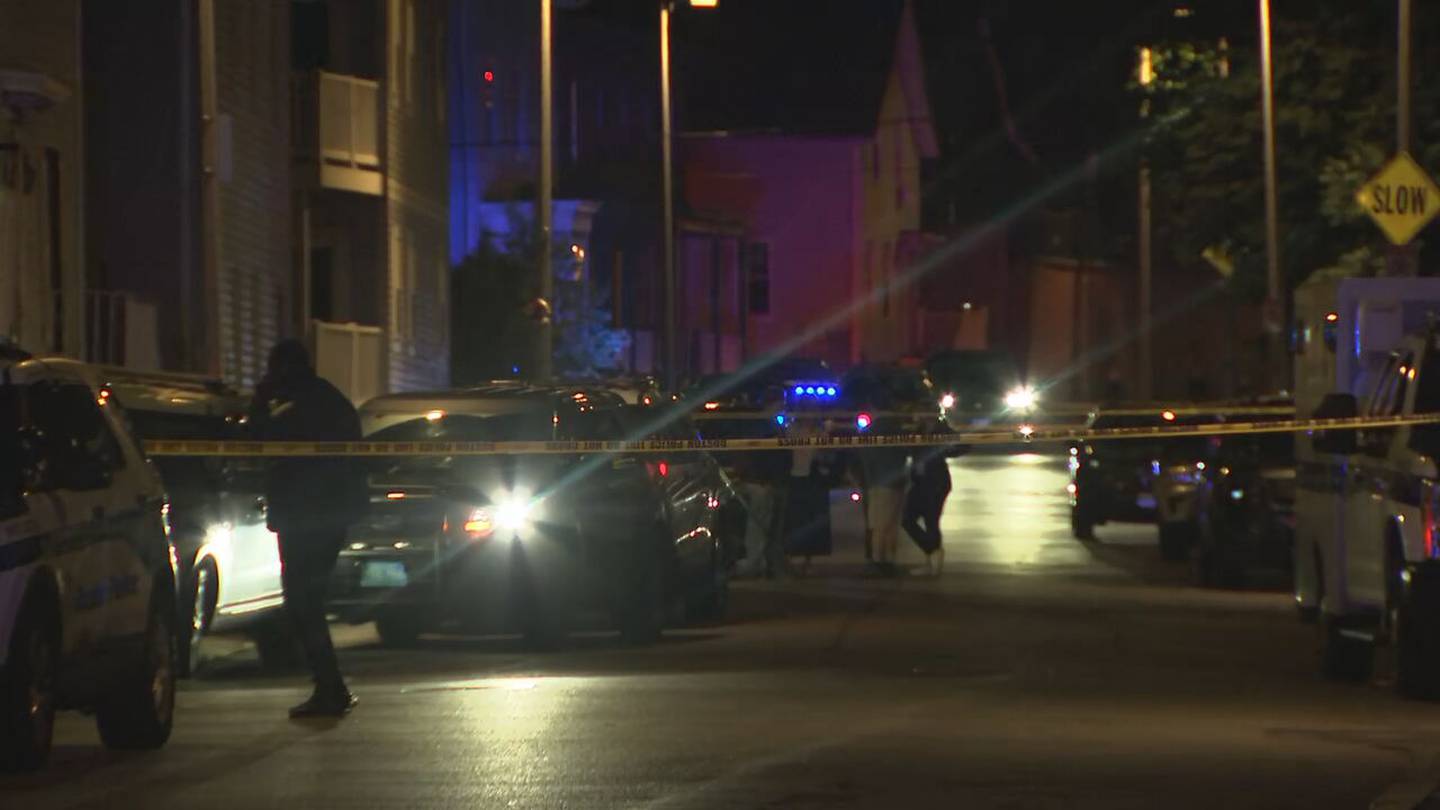 Suspect in custody after Boston police officer shot multiple times during robbery in progress.