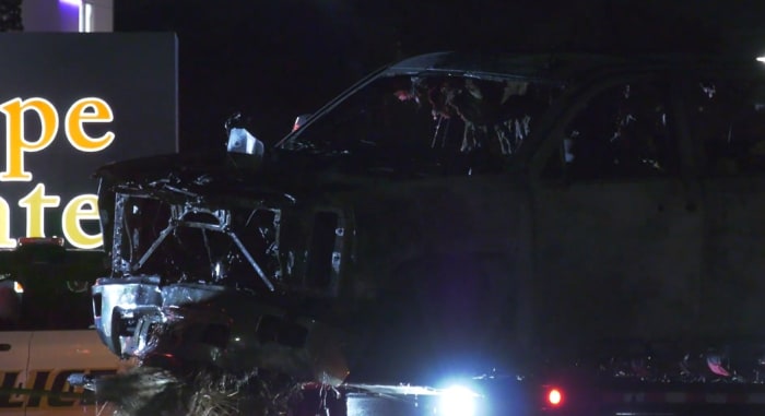 Police search for driver who fled after crashing into apartment complex.