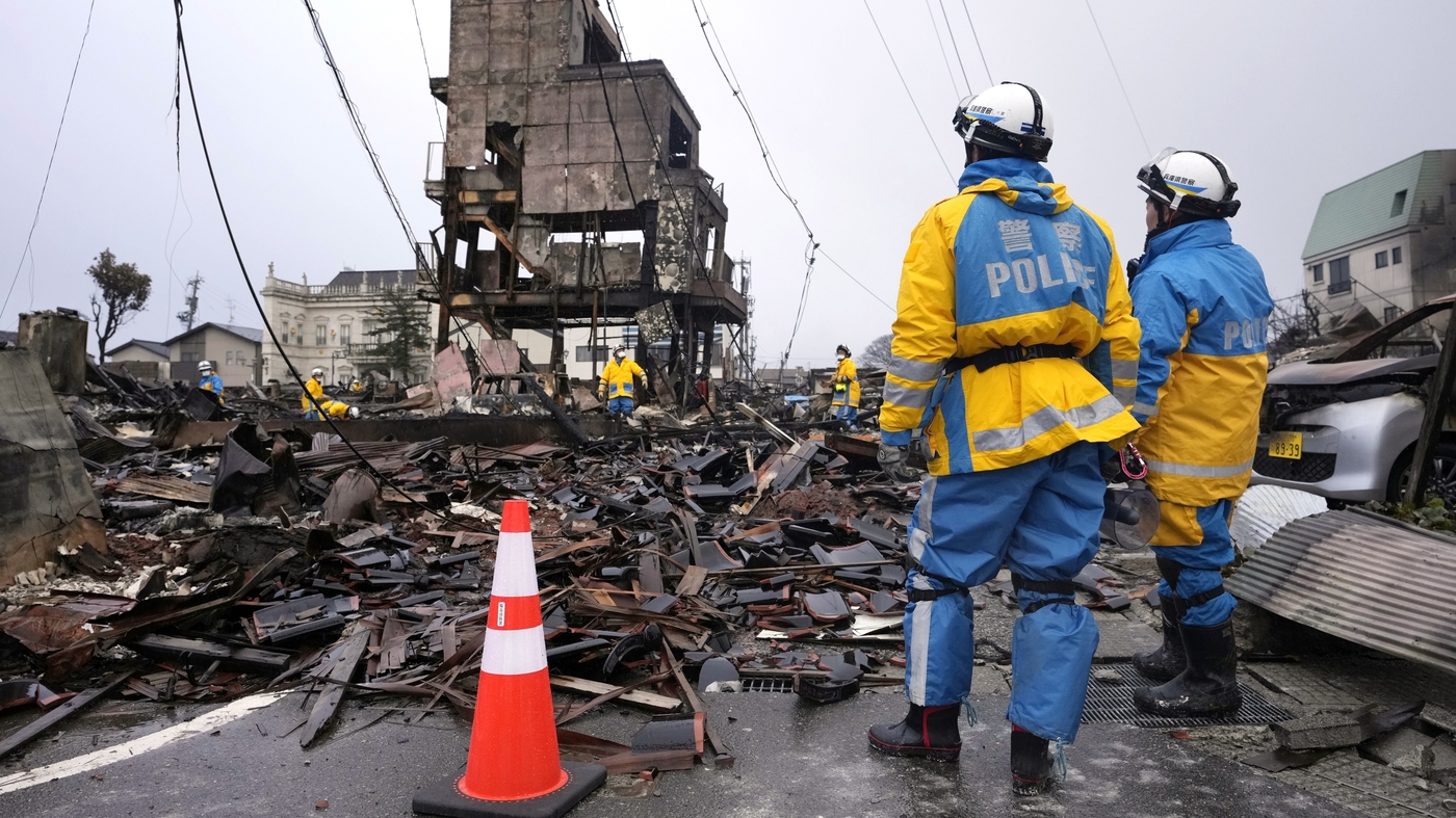 "Japan Earthquake Survivors Face Snow Hindrances and Government Aid Pledges"