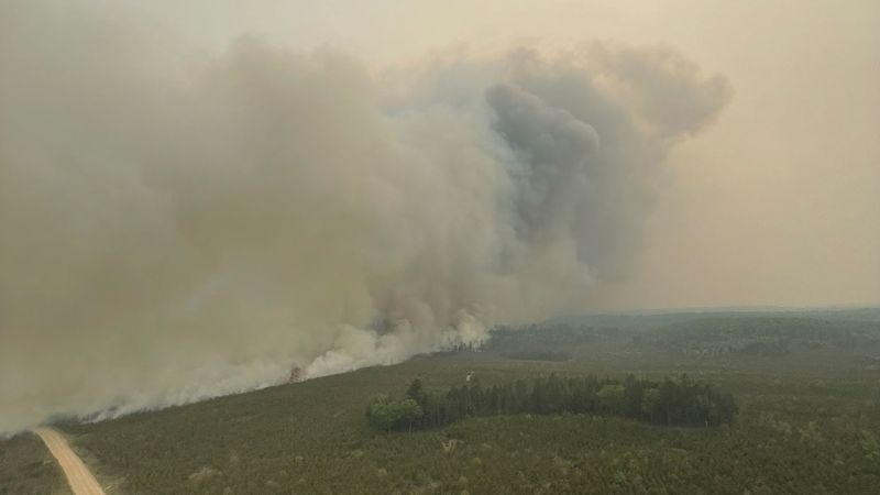 Wildfire forces evacuations and highway closure in Northern Michigan.