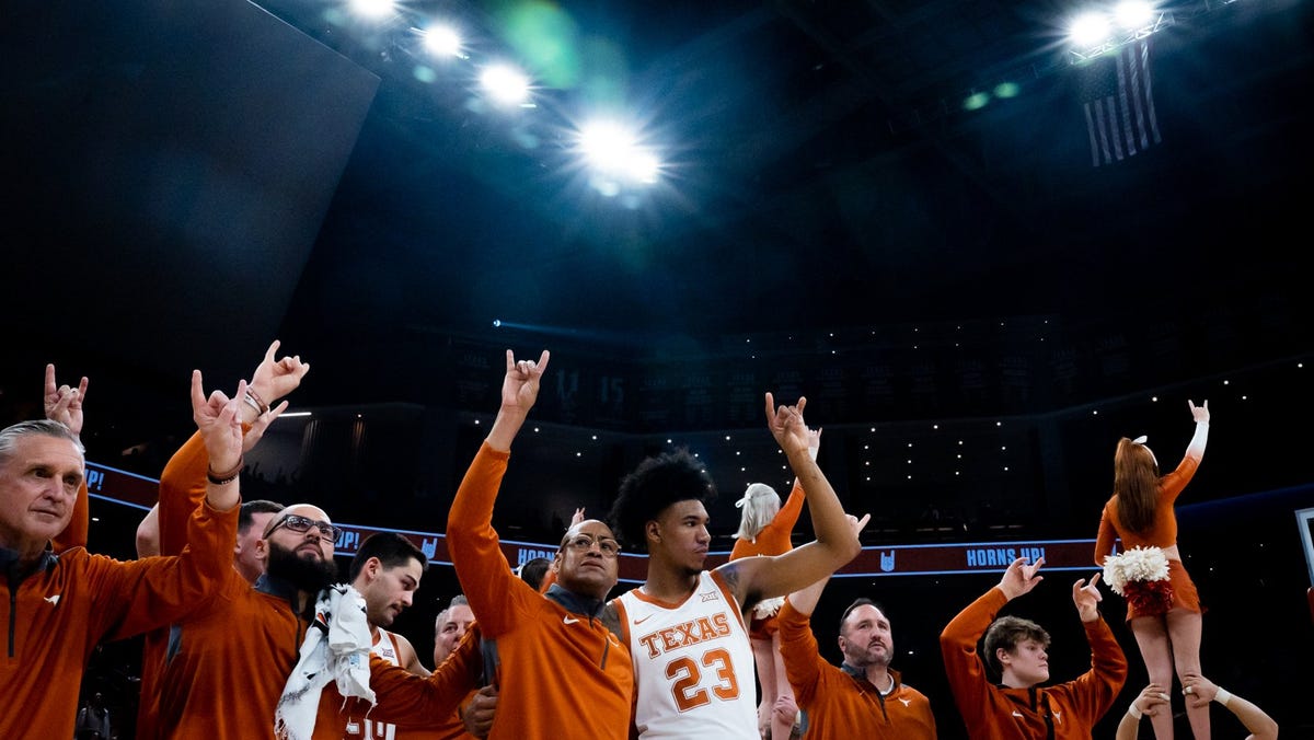 Featured image for Rodney Terry named head coach of Texas men's basketball team after Elite Eight run.