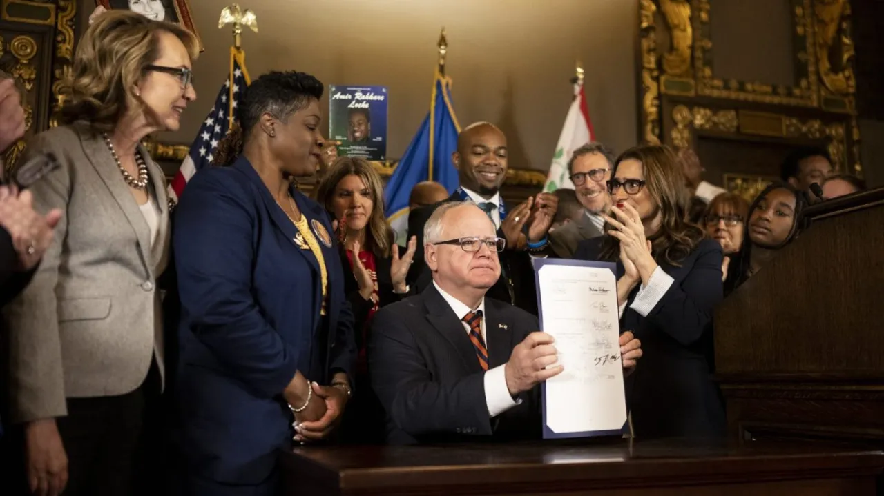 Featured image for Minnesota Governor Tim Walz signs comprehensive gun safety legislation.