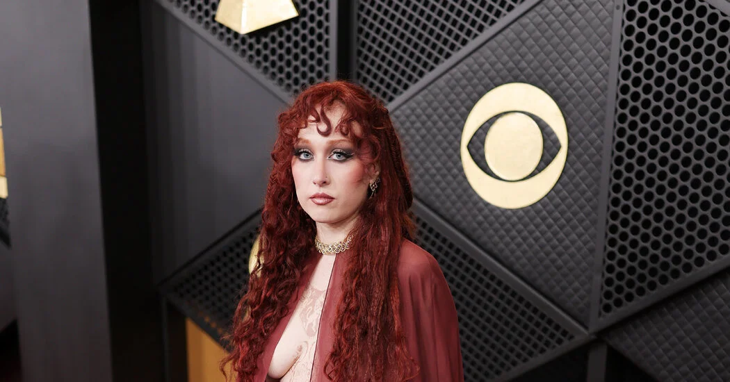 Chappell Roan Stuns Grammys Red Carpet with Pierced-Skirt Naked-Dressing Moment