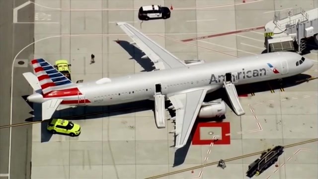 Featured image for Laptop Fire Forces American Airlines Evacuation at SFO, Injures 3