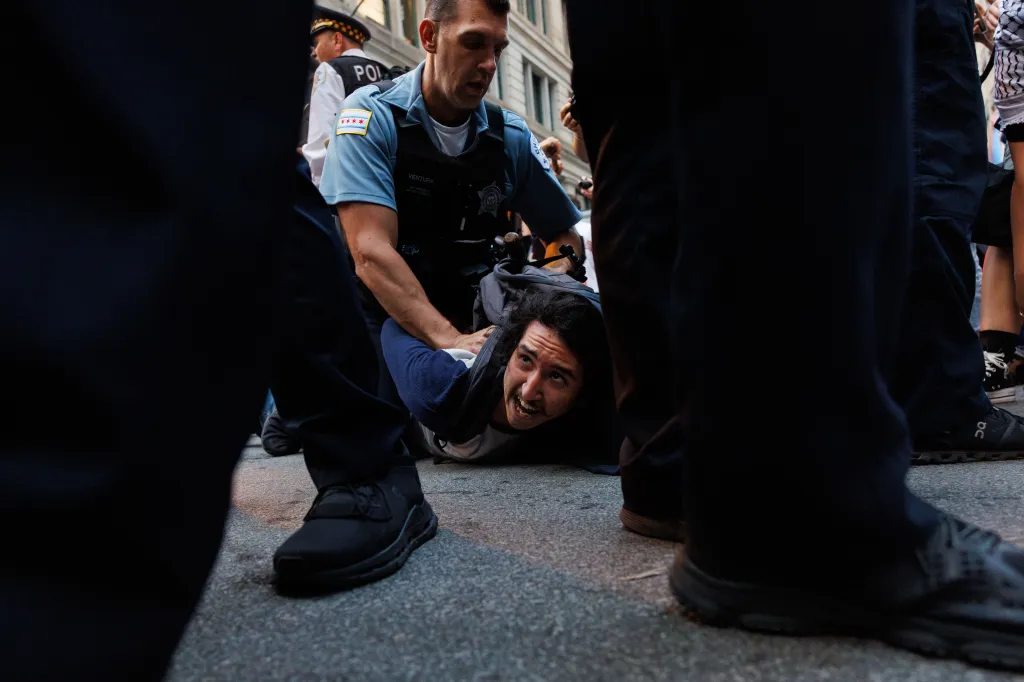 Chicago anti-ICE protests lead to arrests and a car incident in downtown