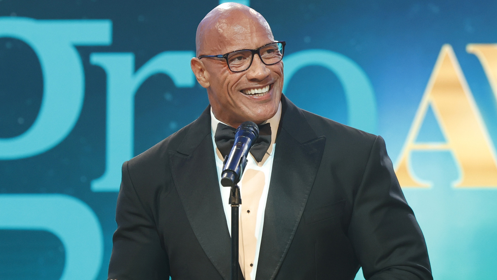 "The Rock's WrestleMania 2024 Plans: Roman Reigns, Cody Rhodes, and a Shocking Twist"