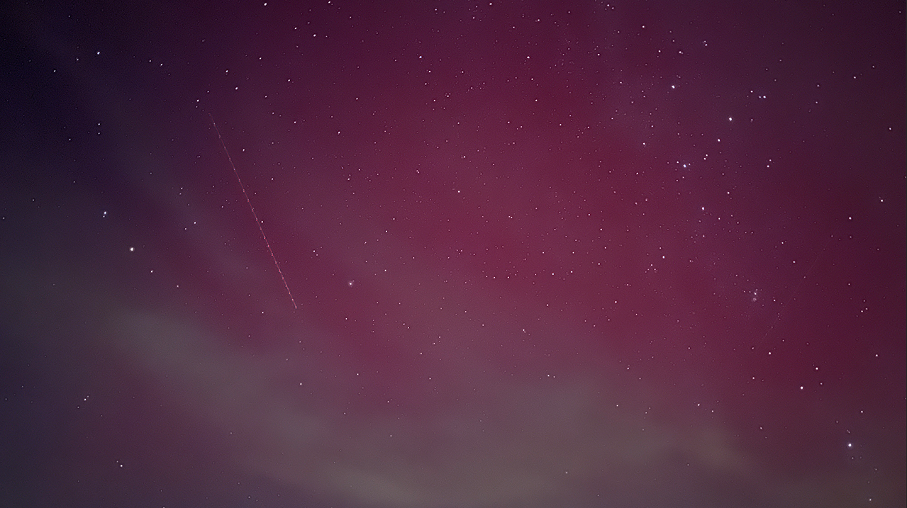 Featured image for "Unexplained Red Light Mystifies Kansas Residents in Rare Night Sky Phenomenon"