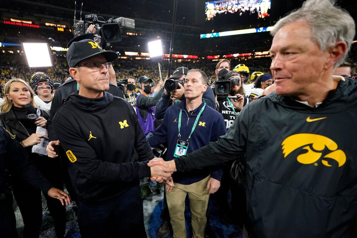 "Resilient Hawkeyes Set to Battle Michigan in 2023 Big Ten Championship Game"