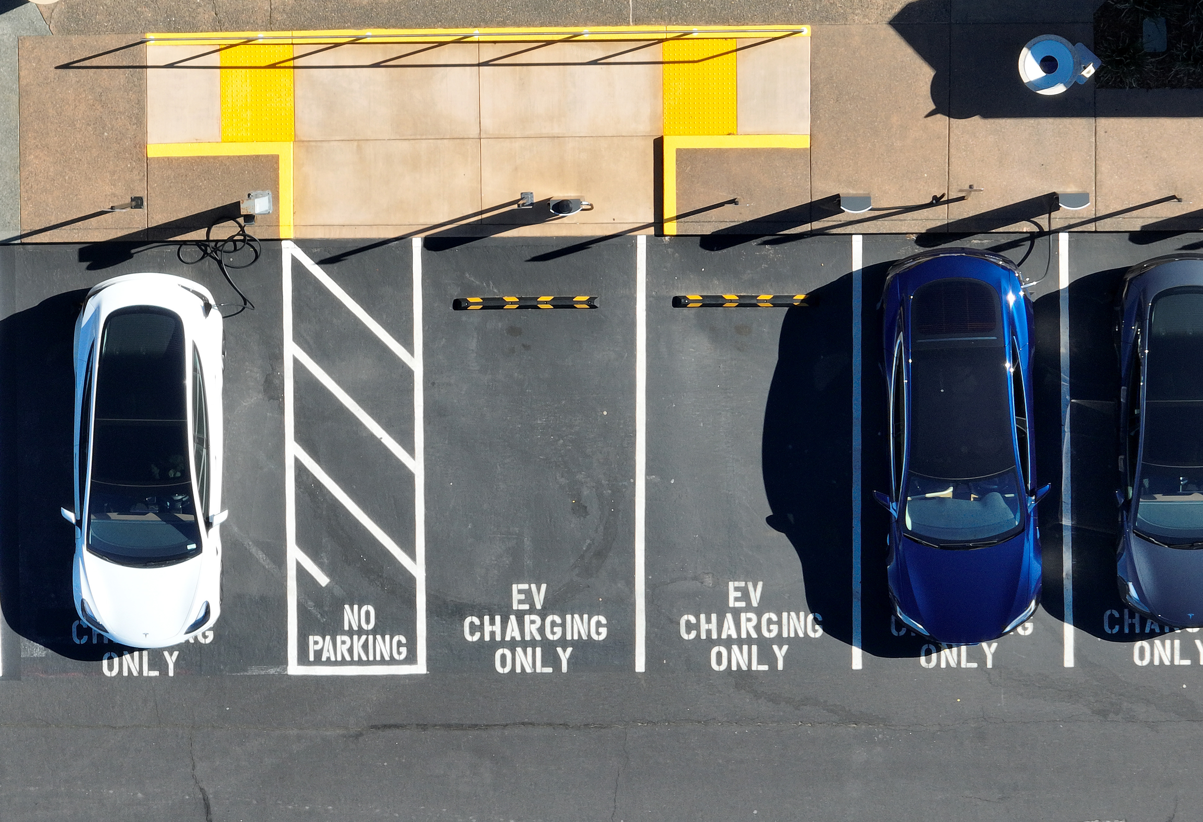 Featured image for Navigating the Complexities of EV Tax Credits and Global Markets.