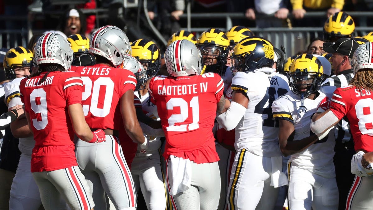 "Michigan dominates Ohio State in thrilling football showdown"