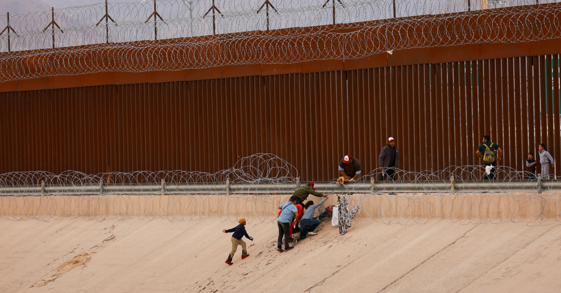 Biden Tightens Border, Faces Backlash Amid Migration Surge