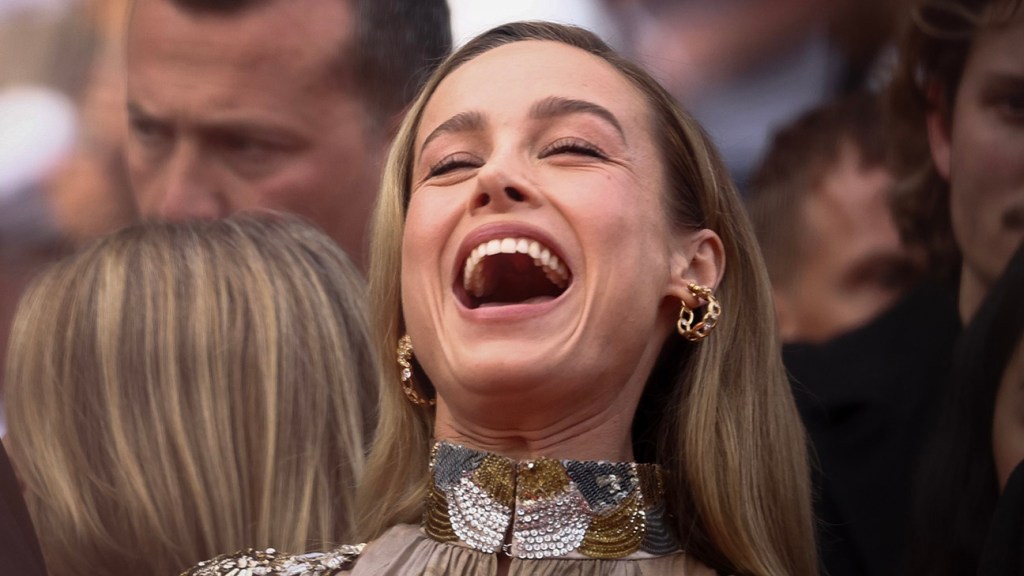 Brie Larson's Cannes debut overshadowed by controversy surrounding Johnny Depp's appearance.