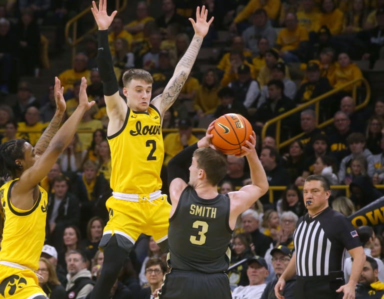 Featured image for "Purdue Dominates Iowa 84-70 in Big Ten Showdown"