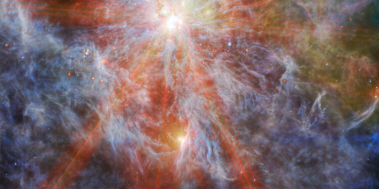 "Webb Telescope Captures Spectacular Star Cluster in Nearby Galaxy"