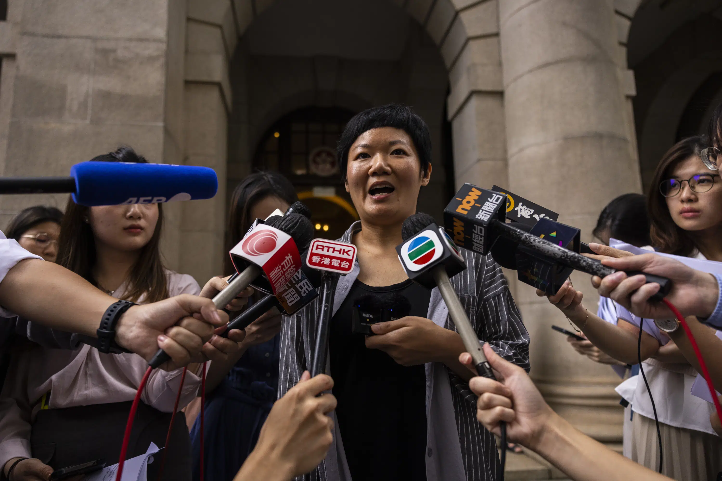 Hong Kong journalist wins rare appeal for media freedom.