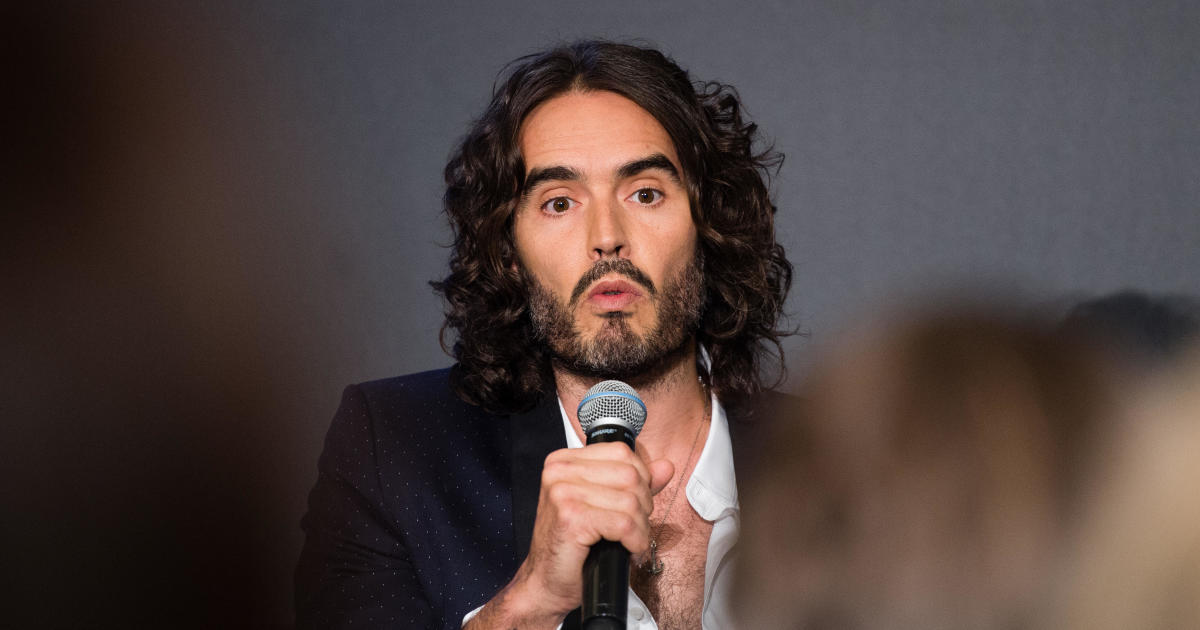 Featured image for UK Prosecutors Review Charges Against Russell Brand in Assault Case