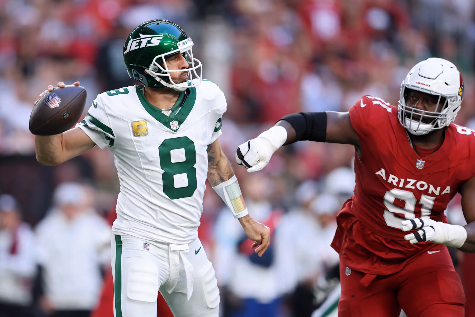 Jets' Playoff Dreams Crushed in Cardinals' Dominant Victory