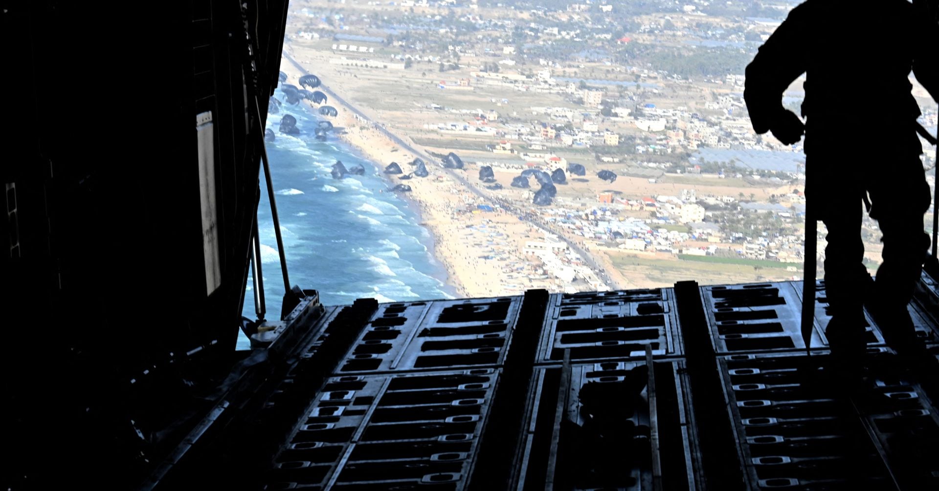 "US Conducts First Humanitarian Airdrop in Gaza Conflict"