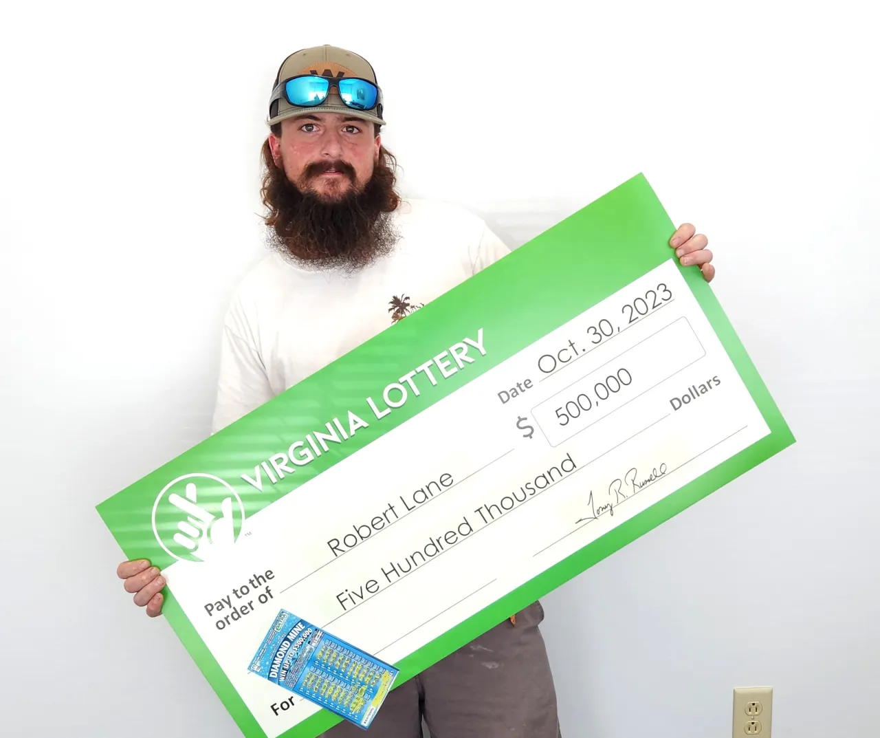 Featured image for Lucky Plumber Celebrates $500,000 Lottery Win with Dogs