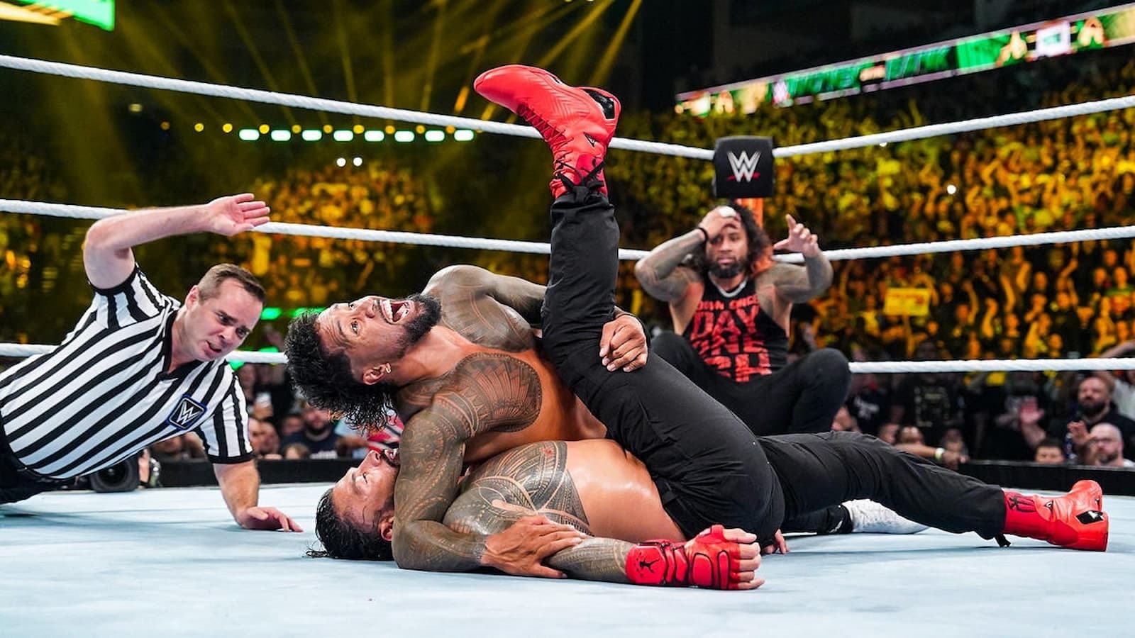 "The Bloodline's Future in WWE: Mark Henry's Insights and Roman Reigns' Authority"