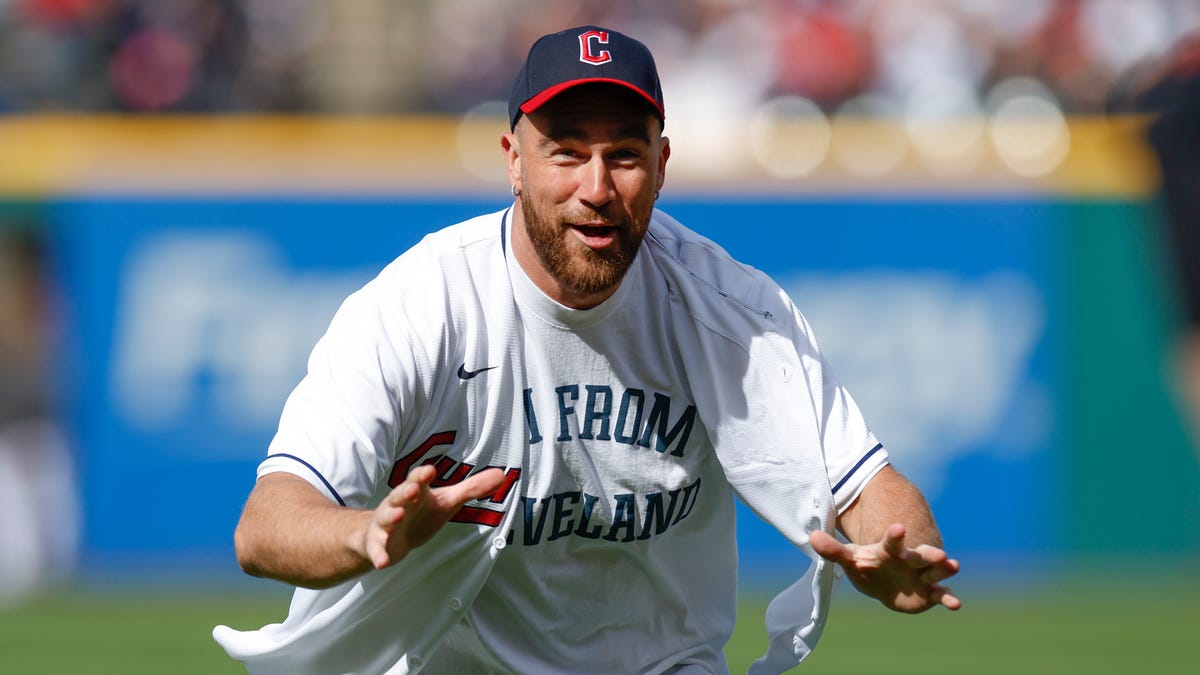 Travis Kelce's wild first pitch at Guardians' home opener delights Patrick Mahomes.