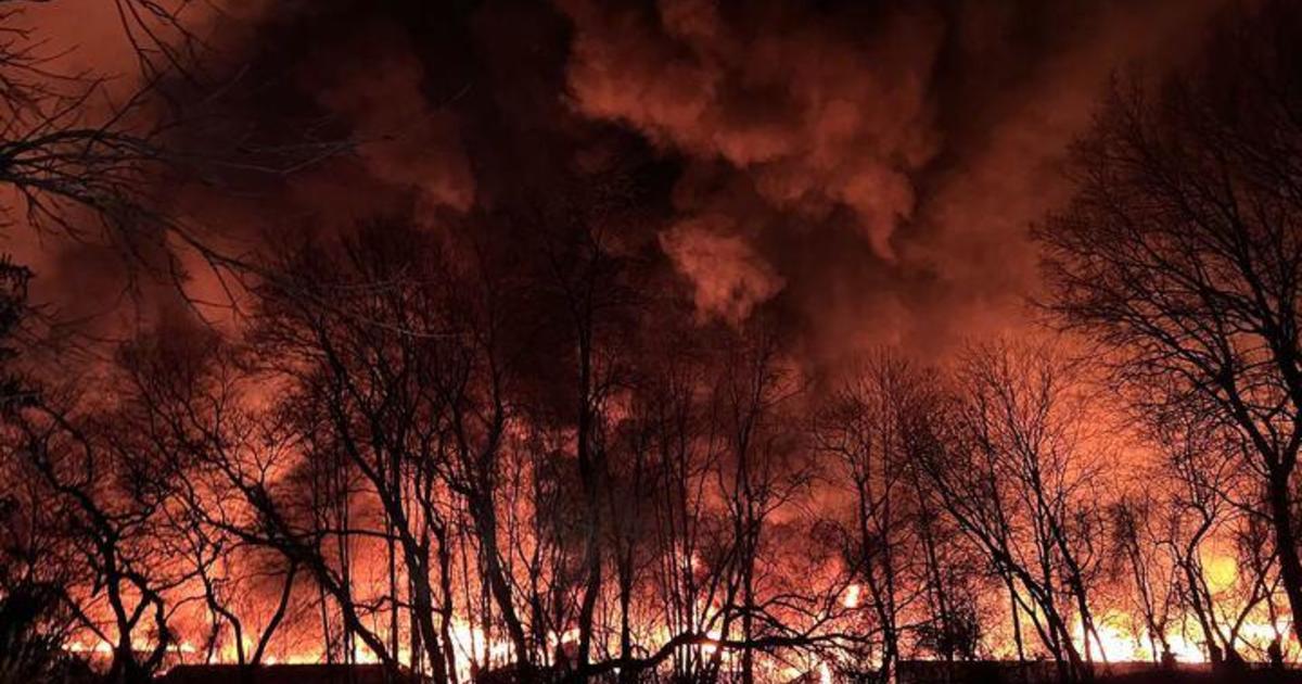 Massive warehouse fire in West Easton still smoldering after multiple alarms.