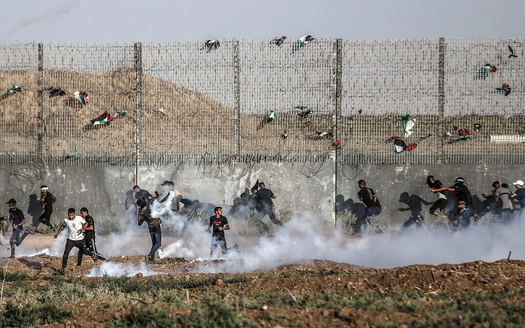 "Violent Clashes Erupt as Palestinians Protest on Gaza Border, IDF Involvement Results in Multiple Injuries"