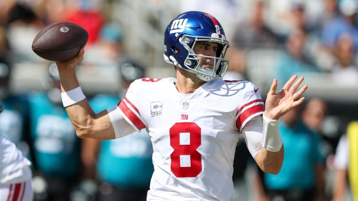 "Sunday Night Showdown: Cowboys vs. Giants - Predictions, Picks, and Parlays"