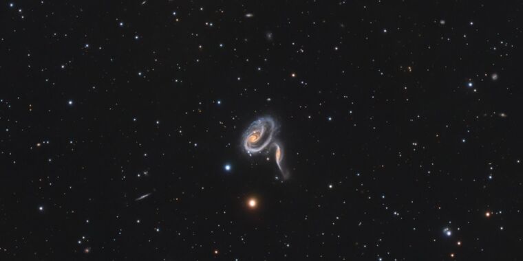 Cosmic Collision: Galaxies Clash in Distant Universe