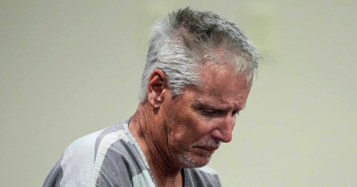 Father of Georgia school shooter pleads not guilty in court