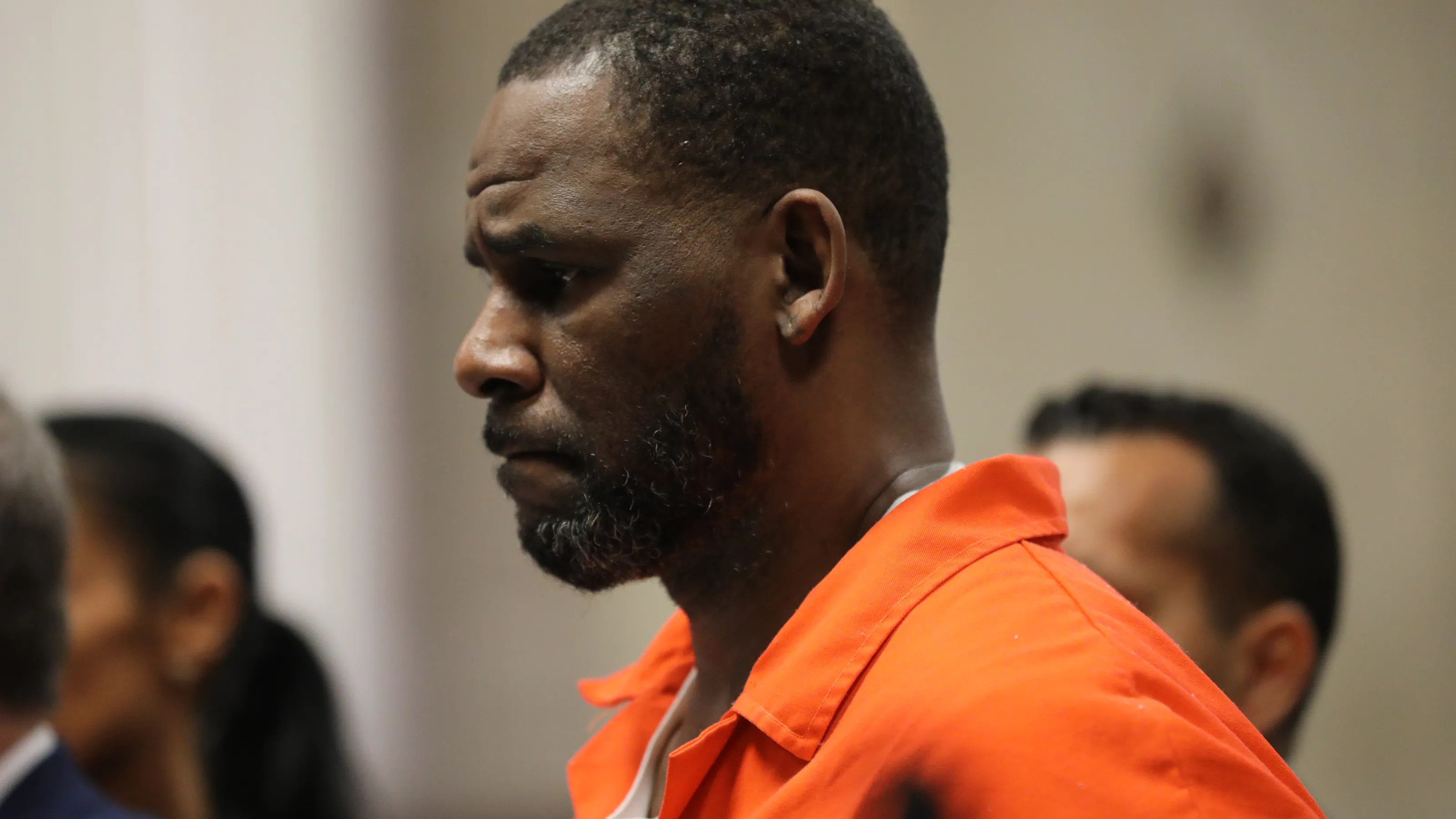 Featured image for R. Kelly Hospitalized Amid Allegations of Murder Plot and Pardon Bid
