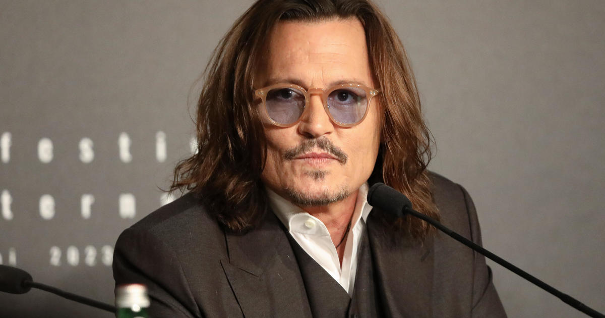 Featured image for Johnny Depp's Cannes Film Festival Experience: Standing Ovation, Teeth Criticism, and Hollywood Departure