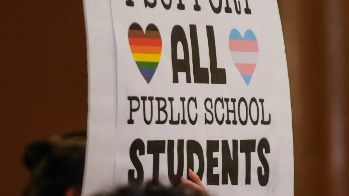 Iowa schools pledge to follow transgender bathroom law.