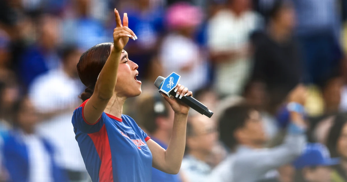 Featured image for Nezza Performs Spanish National Anthem at Dodgers in Protest of Immigration Raids