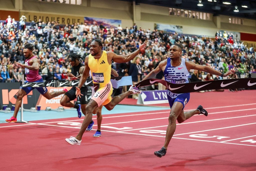 Featured image for "Noah Lyles Triumphs Over Christian Coleman at 2024 USA Indoor Championships"