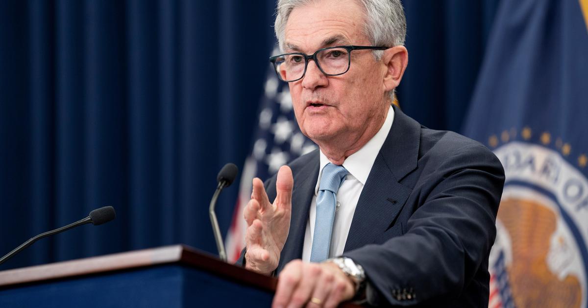 Fed raises interest rates, signaling a potential end to hikes.
