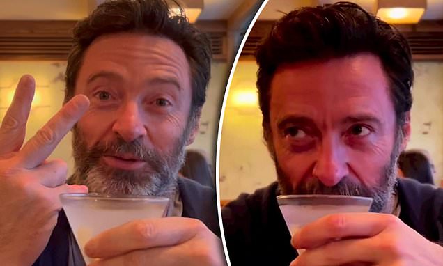 Hugh Jackman celebrates negative skin cancer test results with double martinis.