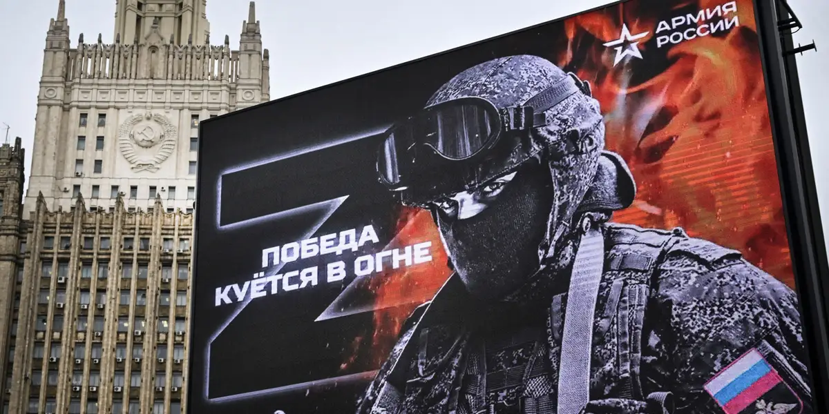 Russia's controversial 'real man' recruitment campaign sparks debate.